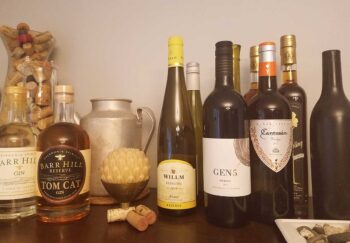 A household collection of wine and liquor. Half of Americans don't realize alcohol is a carcinogen.