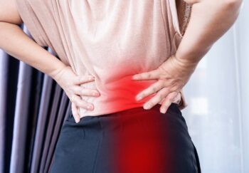 closeup of woman suffering from sciatica